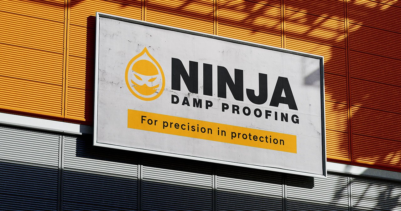 Ninja Damp Proofing logo design on bilboard Advert Minimal logo for Glasgow tradesperson brand featuring ninja face inside water droplet