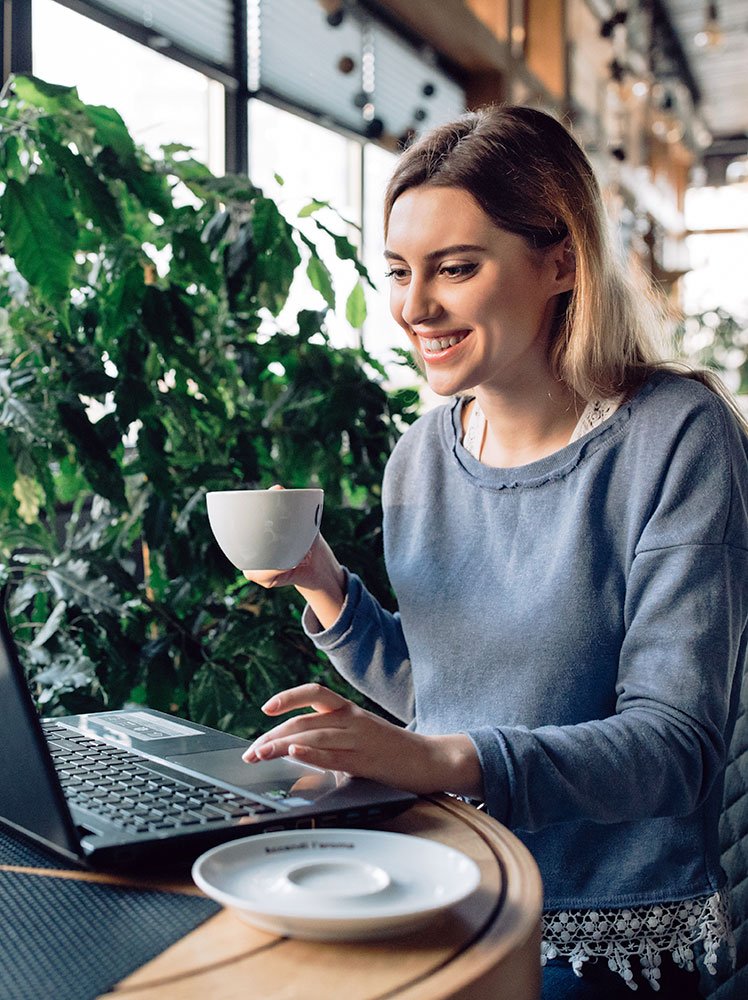 Female business owner planning her day – supported through branding and business support services.