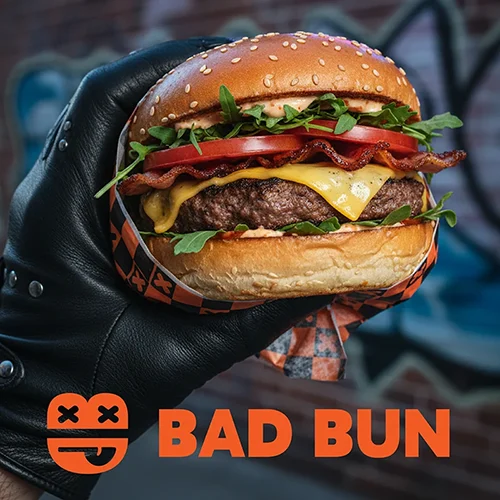 Bad Bun Logo with image of gourmet burger wrapped in branded wrapping