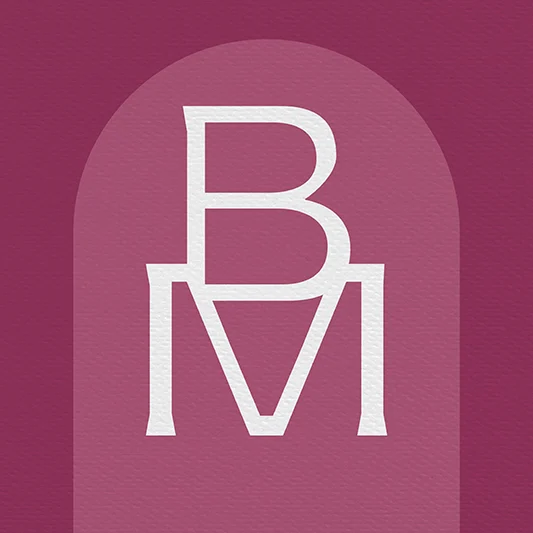 The Boss Mums Monogram shown in isolation, coloured white on the brand pink background